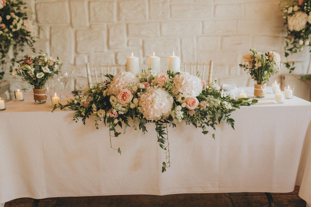 Sweetheart Top Table for bride & groom . Vintage mixed with classic
barn wedding