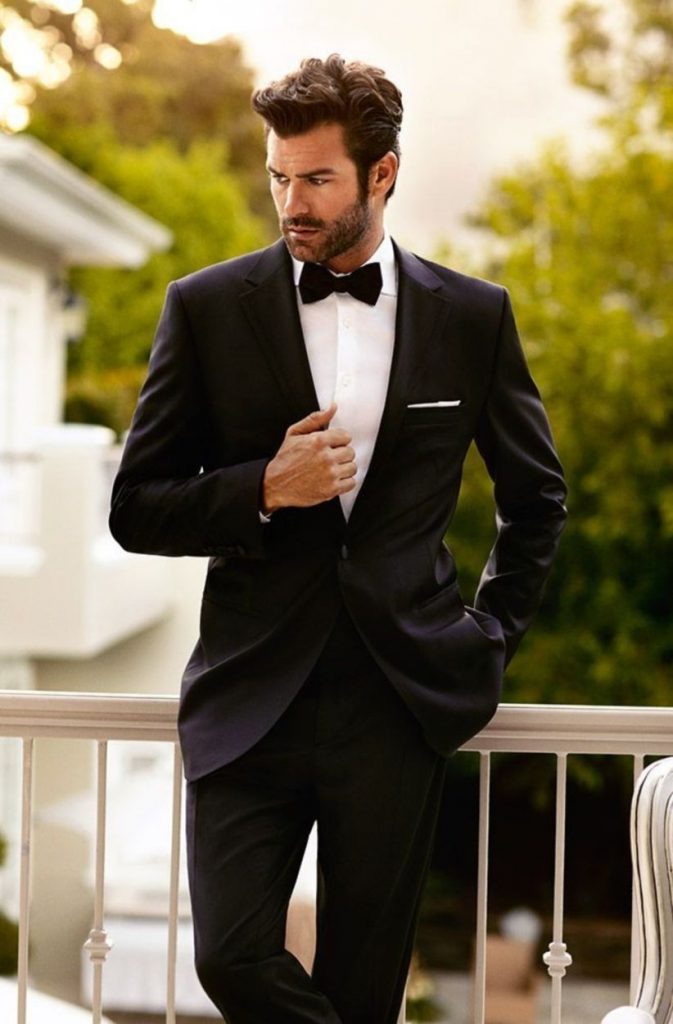 black suit and black tie