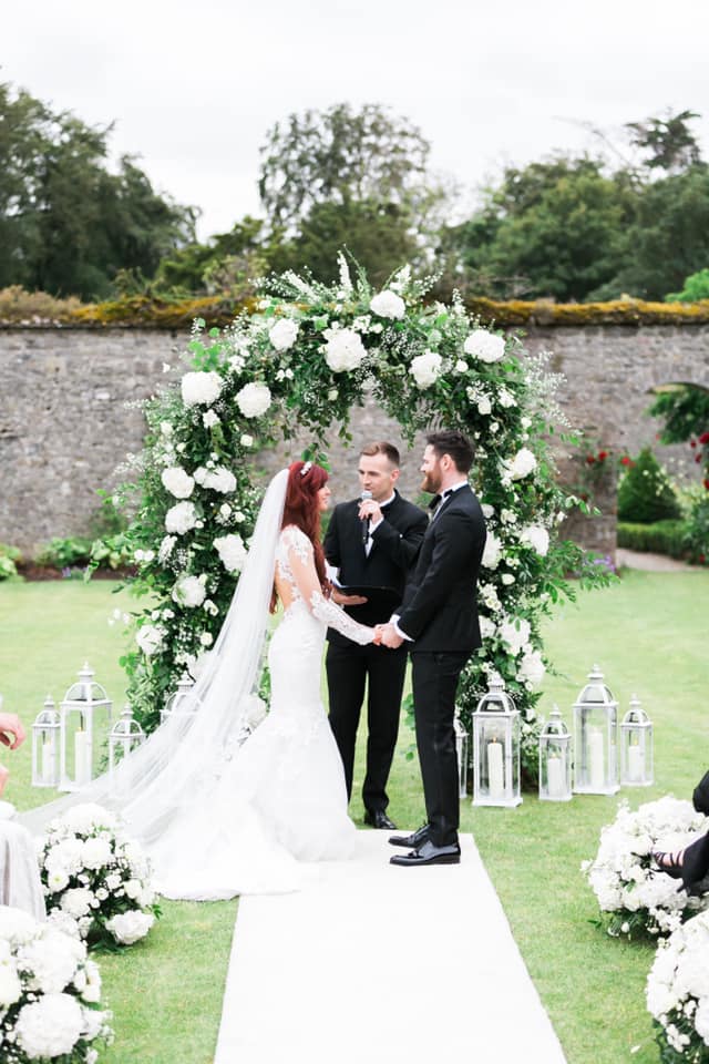 Bride and Groom holding hands during the ceremony