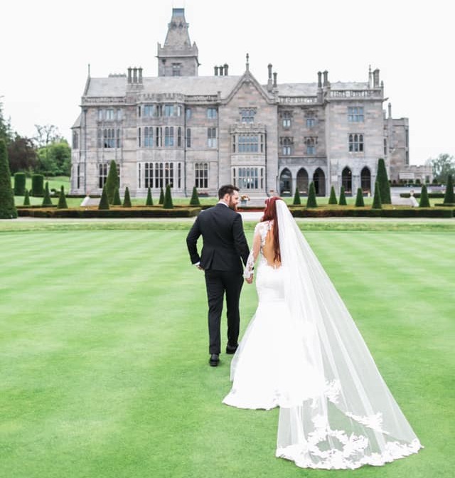 Couple walking towards Adare Manor