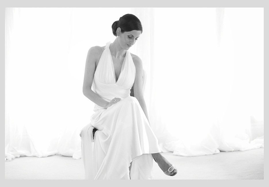 Bride sitting in her wedding dress