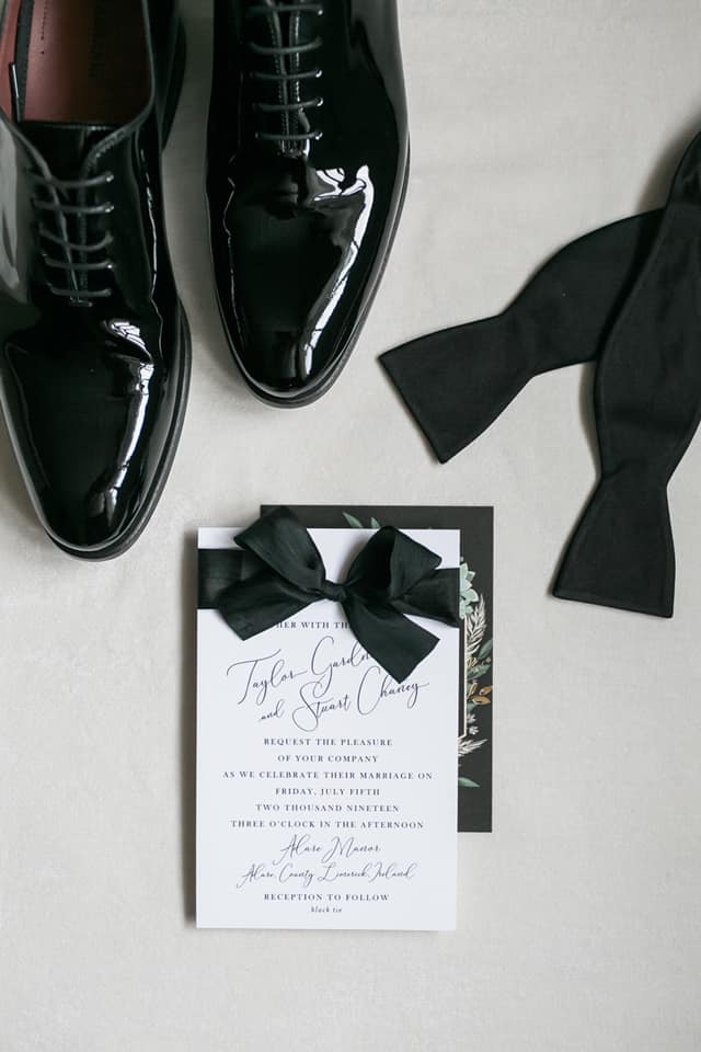 Save The Date with groom's shoes and bowtie