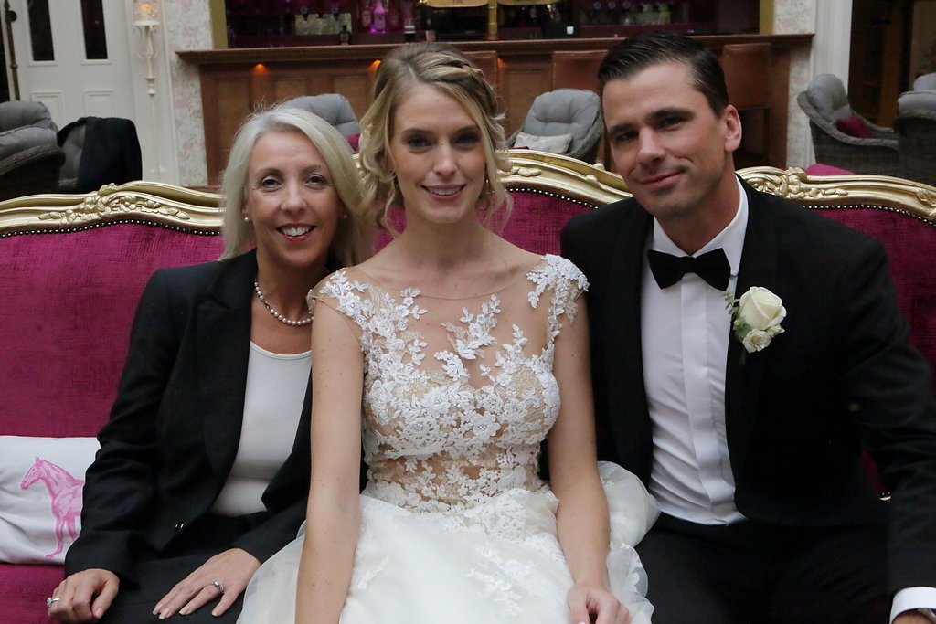 Michelle with bride and groom