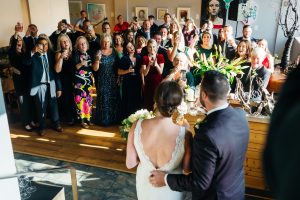 Couple greeting their guests on arrival at Loam Restaurant