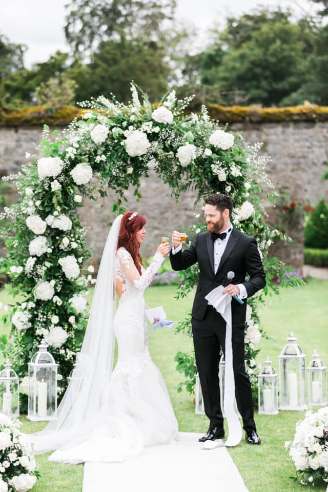 Couple toast DAd at end of ceremony Dream Irish Wedding