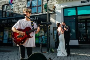 Couple dancing on the streets of Galway City