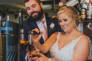 Couple pouring beer