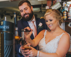 Couple pouring beer